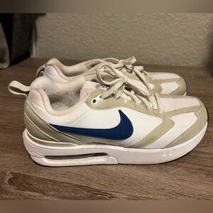 Nike White Sneakers with Dodger Blue Swoosh.